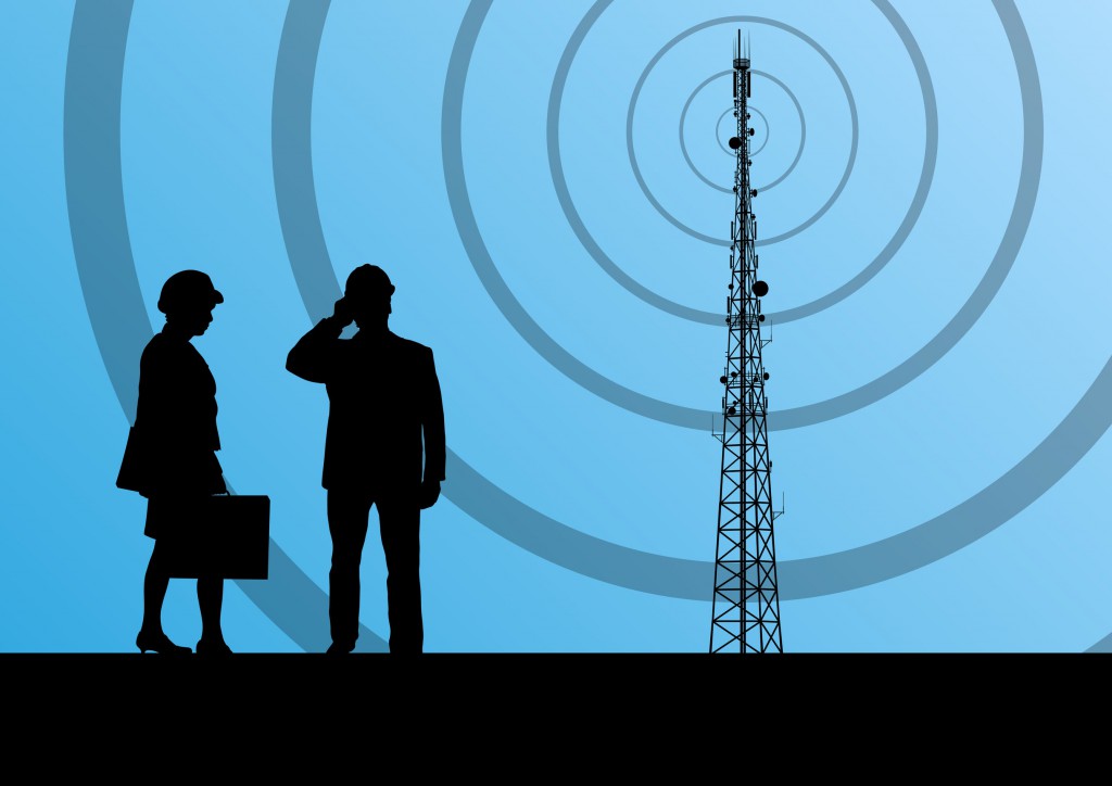 22893884 - telecommunications radio tower or mobile phone base station with engineers in concept background